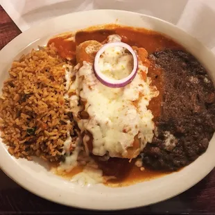 a plate of mexican food with rice and beans