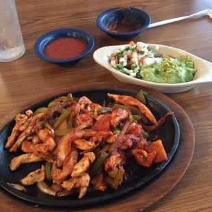 Chicken Fajhitas!  Awesome.  Paleo Friendly extra Guacamole and Pico!  Salsa has a nice kick to it.