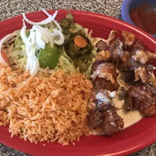 Bacon wrapped shrimp dinner.