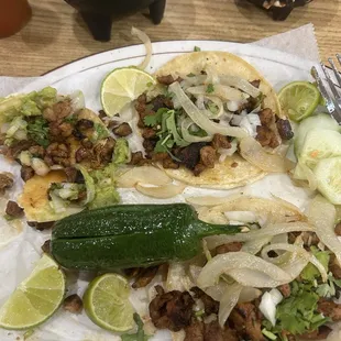 Pastor tacos, cilantro, onion, lime, delicious Guacamole