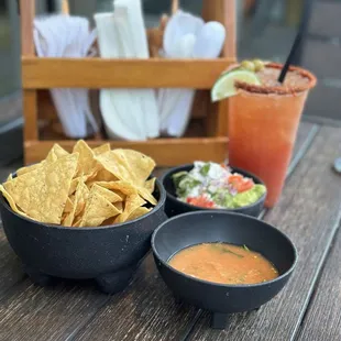 Guacamole with chips and michelada