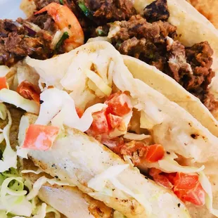 Grilled fish taco, surf n turf taco, machado fish taco