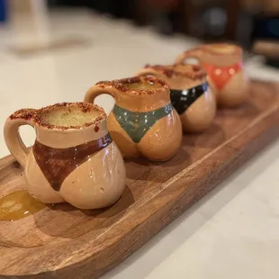 a row of coffee mugs