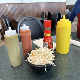 From the left, jalapeño salsa, habanero salsa, coleslaw, hot sauce (great flavor and heat), and tomato sauce