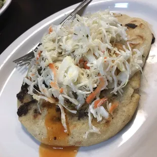 These Pupusas With beans and cheese and the other was squash and cheese  were delicious.  Definitely coming back and bringing my family .