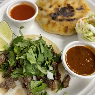 Carne Asada taco and Pupusa