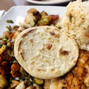 Salvadoran enchiladas 2 per order $8.00 Garnished with refried beans, cabbage salad picadillo de verdura with chicken, special sauce .