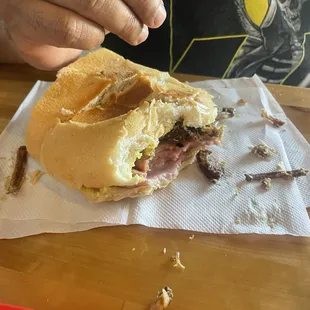 Half of the cuban sandwich.