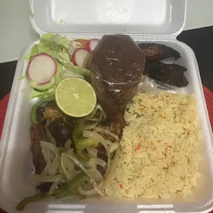 Fajita steak, Salvadorian sausage, beans, rice and salad