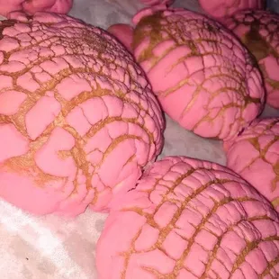 pink cookies with gold sprinkles
