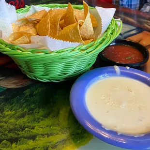 Cheese dip, chips and salsa