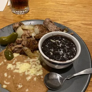 Carnitas M..... (House Special on menu) . Substituted rice for black beans.