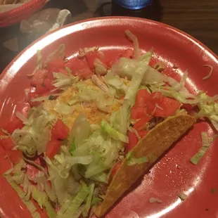 This is what 2 chicken tacos look like. Soon as she placed them on the table,I took this picture.