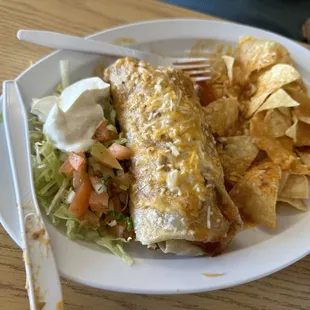 Bacon Breakfast Burrito smothered enchilada style in Green Chile!