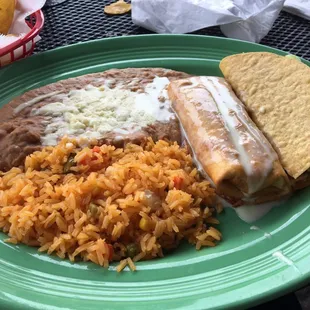 Lunch special chimichanga &amp; taco with rice and beans.