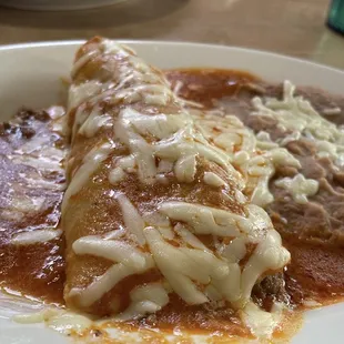 Beef Enchilada with side of beans