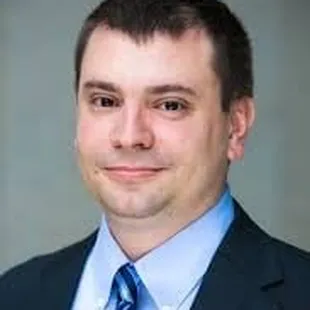 a man in a suit and tie