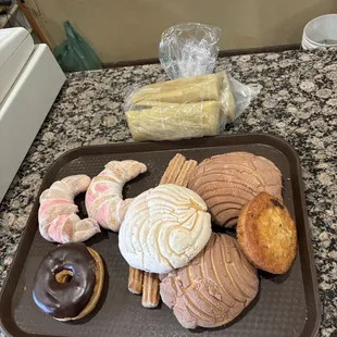 Pan dulce and tamales in the back.