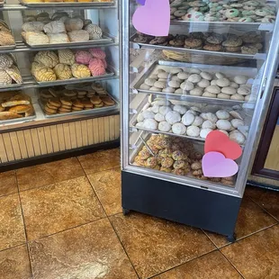 a display case full of donuts