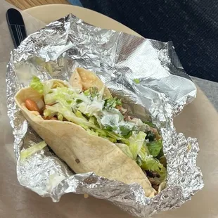 Small carne burrito with beans and rice.