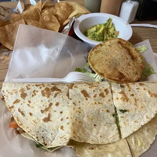 Shredded chicken quesadilla, steak Gordita and chips and guac. All 10/10! And I'm a food critic!