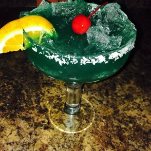 a margarita with a cherry on top