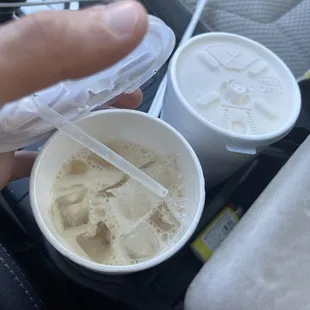 Barely drank and other one going in garbage.