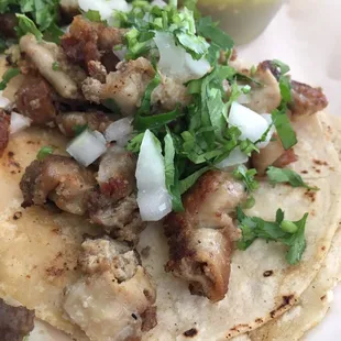 Tripa @ El Ranchito. Ask for it not crispy.