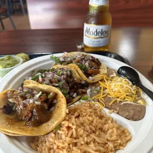 Al pastor tacos with rice and beans, and a cold modelo.
