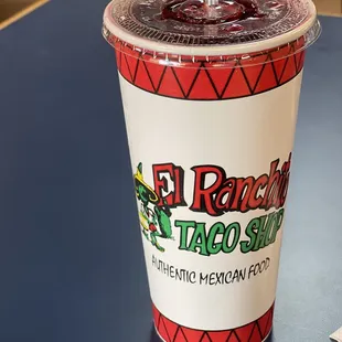 a drink in a paper cup