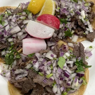 Carne Asada Street Tacos green salsa on the side.