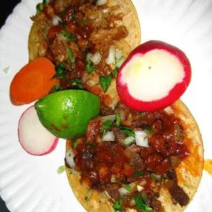 Carne asada and carnitas tacos -- $1 each