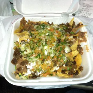 Super Nachos with carne asada