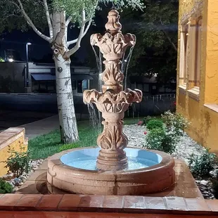 a fountain in a courtyard