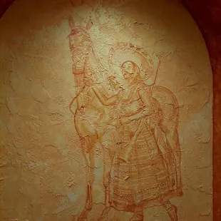a man on a horse and a woman on a horse