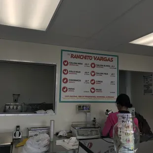 a woman sitting at a counter