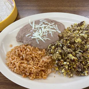 Machaca with eggs and beans and rice.