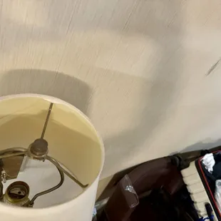 More scuffed walls and the second bedside lamp without a lightbulb