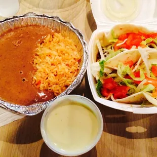 a bowl of rice and a bowl of salad