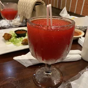 Drink they brought out for us to sip with coffee stirrers