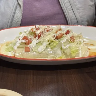 Burrito with ground beef and cheese sauce