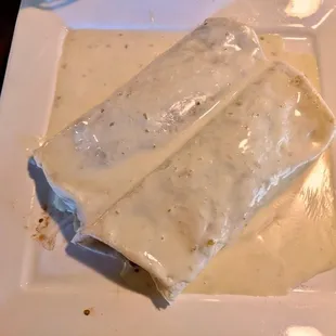 Order the Lorenzo! A single veggie burrito #4, but now doubled with the beans and rice inside slathered in delicious a cheese sauce. Yummy!