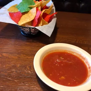 Chips and salsa. Colorful chips and a big salsa bowl!