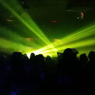 a crowd of people watching a concert