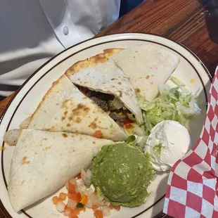 Steak quesadilla that my husband got. He cleaned his plate!!