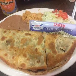 This is the beef quesadilla plate, with beans, rice and a salad.