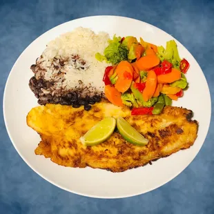 Pescado a la Plancha. The BF liked it. I chose Rice &amp; Black beans and vegetables as his sides.