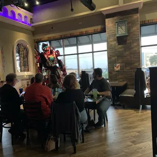 The Transformer dancing around at each table
