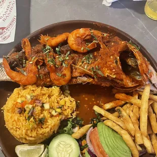 Huachinango a la Diabla AHMAZING! Red snapper with red spicy salsa, prawns, rice, fries and salad. So very delicious!