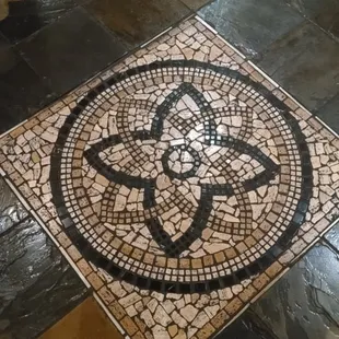 Nice tile pattern inlaid in the floor.